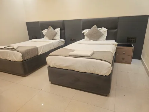 Deluxe Twin Room — Deluxe Twin Bedroom at Hotel The Glass House